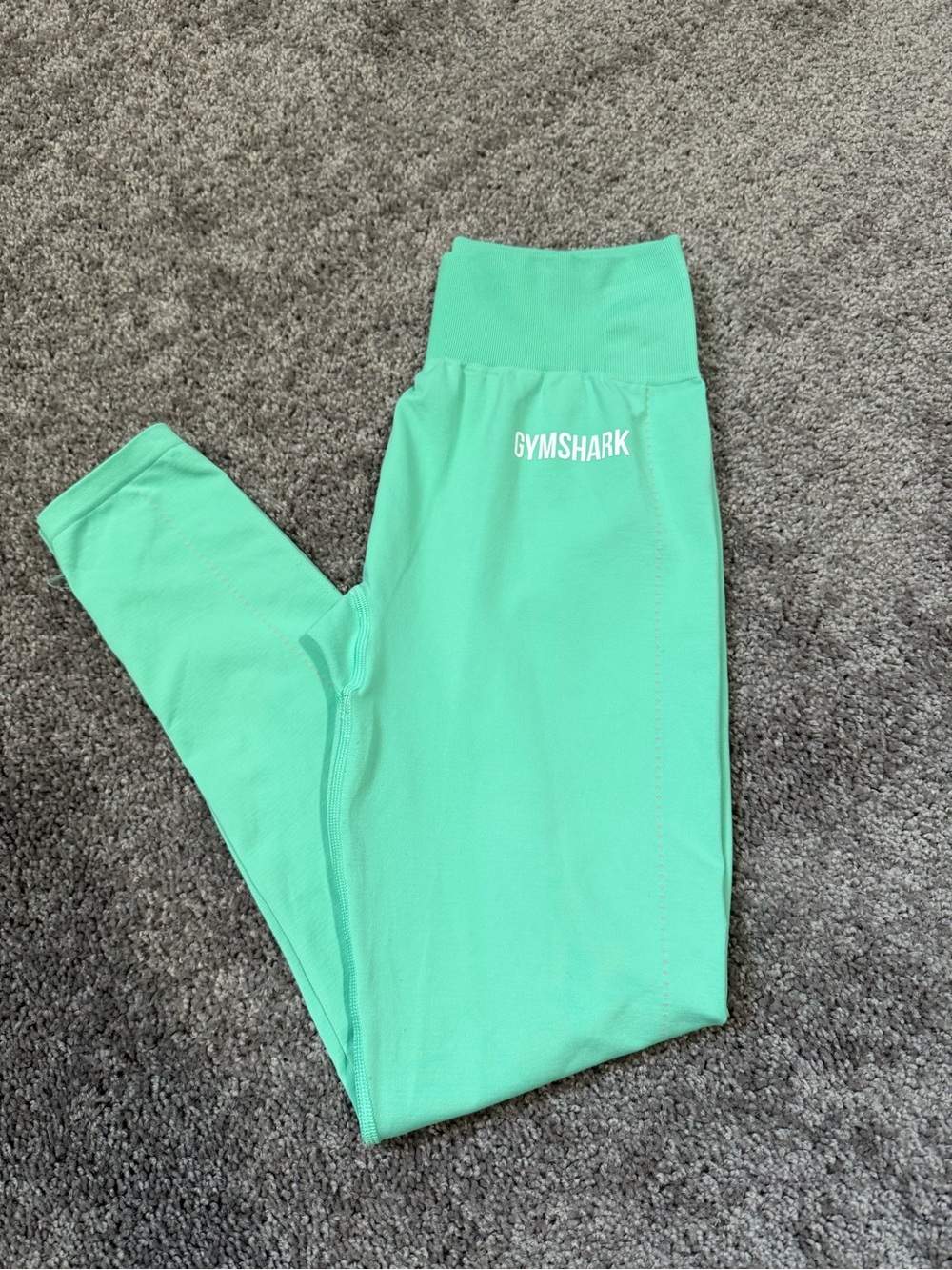 Mint green w/light grey circles down the side Gymshark leggings Size M SEE DESC